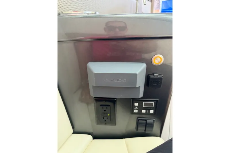 Slide: The Image of Control panel with JL Audio system on a 2020 Nor-Tech boat. - 24