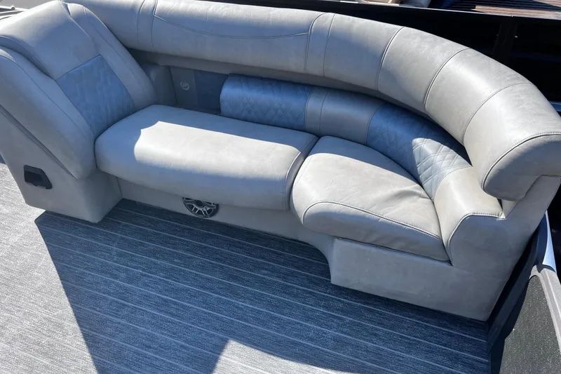 Slide: The Image of Luxurious gray seating on 2022 Premier Escalante boat, featuring plush upholstery and modern design. - 27