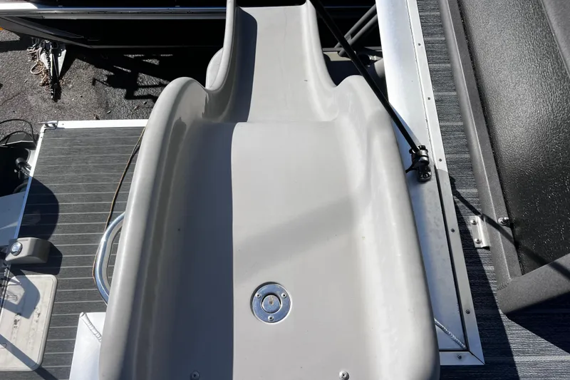 Slide: The Image of 2022 Premier Escalante boat slide, gray surface, outdoor setting, top view. - 24