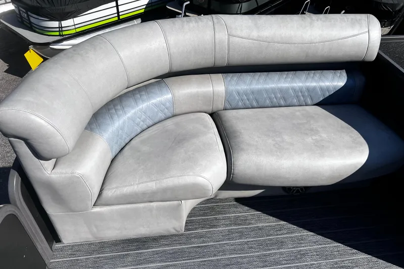 Slide: The Image of Luxurious seating in 2022 Premier Escalante boat, featuring elegant gray upholstery. - 26