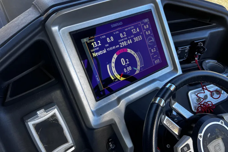 Slide: The Image of Dashboard of a 2022 Premier Escalante with digital display and steering wheel. - 20