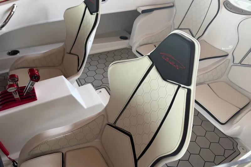 Slide: The Image of 2024 Trick 23 Widebody interior with hexagonal-patterned seats and modern design elements. - 17