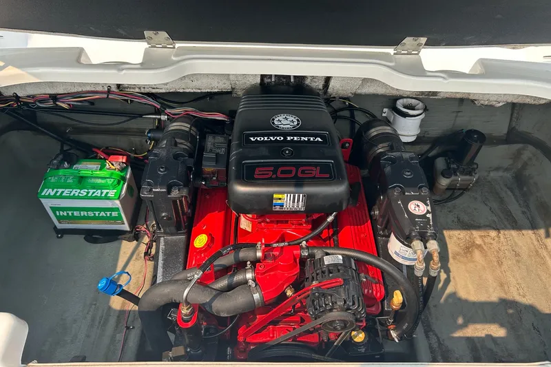 Slide: The Image of Engine compartment of a 2006 Glastron SX 195 with Volvo Penta 5.0GL engine. - 13
