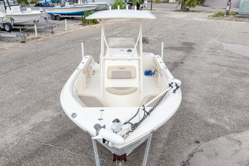 Slide: The Image of 2016 Cobia 201 Center Console boat on trailer in parking lot. - 5