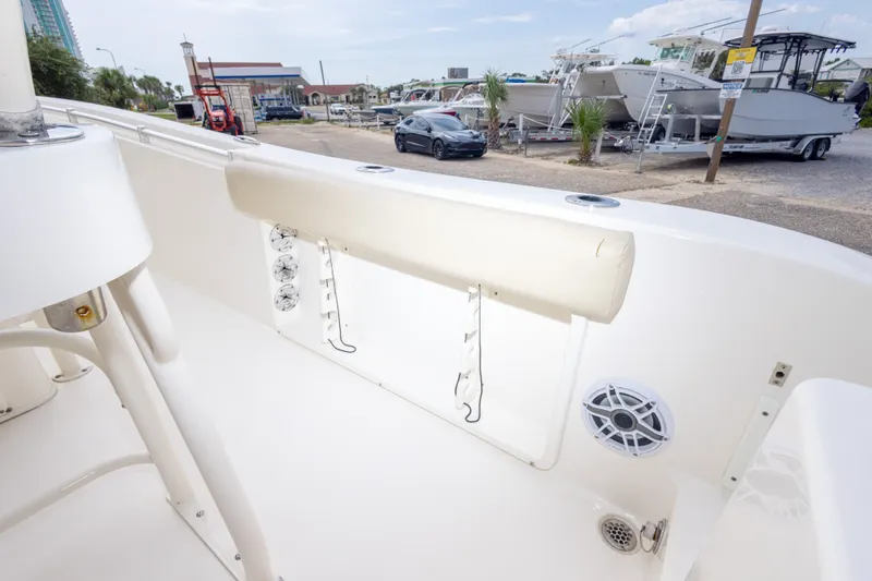 Slide: The Image of 2016 Cobia 201 Center Console boat interior with seating and speaker. - 46
