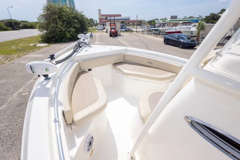 Slide: The Image of 2016 Cobia 201 Center Console boat with spacious seating and modern design. - 28