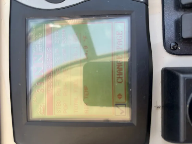 Slide: The Image of A screen on a boat displays various data and settings. - 30