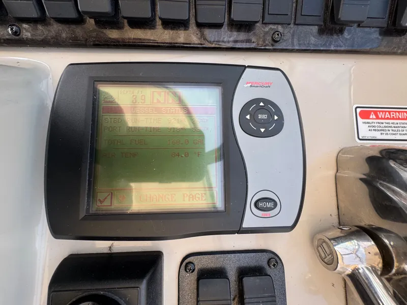 Slide: The Image of A control display showing various boat information, including fuel level and air temperature. - 29