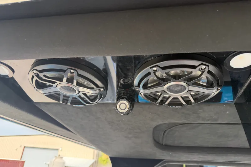 Slide: The Image of Nor-Tech 2027 boat speakers and camera mounted on a sleek black surface. - 21