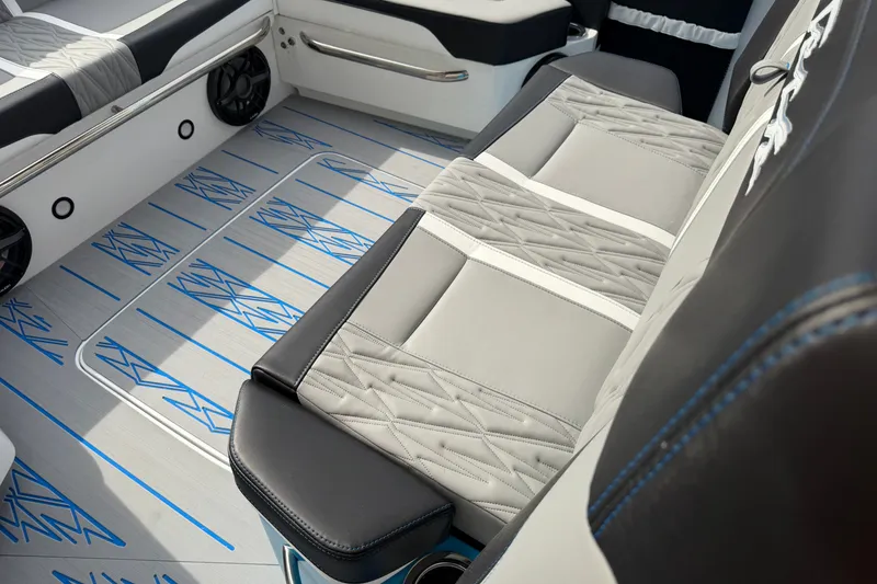 Slide: The Image of 2027 Nor-Tech boat interior with stylish seating and modern design elements. - 36