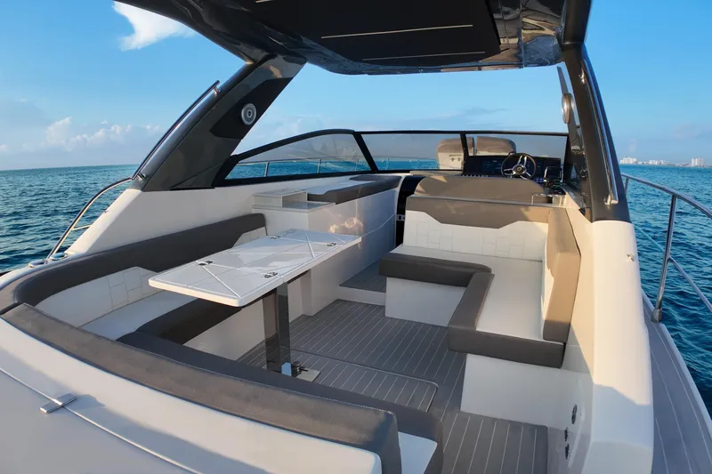 Slide: The Image of Luxurious 2025 Valiatt 380GT yacht interior with sleek seating and ocean view. - 11