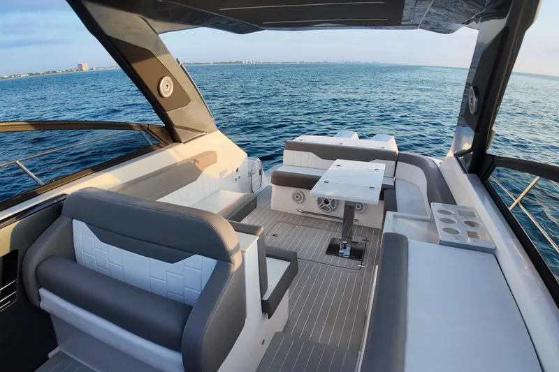 Slide: The Image of Luxurious 2025 Valiatt 380GT yacht interior with elegant seating and ocean view. - 10