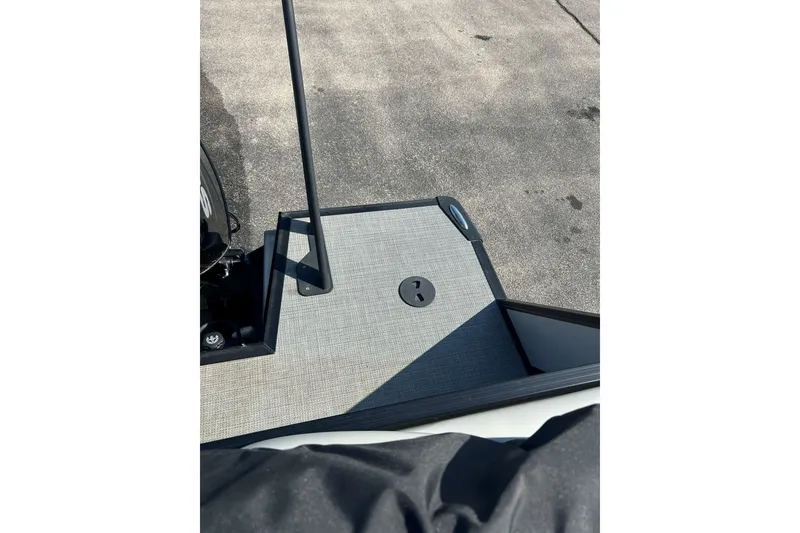 Slide: The Image of Deck of 2026 Viaggio Lago X-U 24 boat with textured flooring and railing. - 5