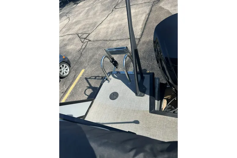 Slide: The Image of Rear deck of 2026 Viaggio Lago X-U 24 boat with ladder and railing. - 3