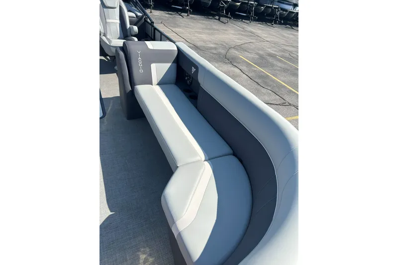 Slide: The Image of Luxurious seating on 2026 Viaggio Lago X-U 24 boat, featuring sleek gray upholstery. - 17