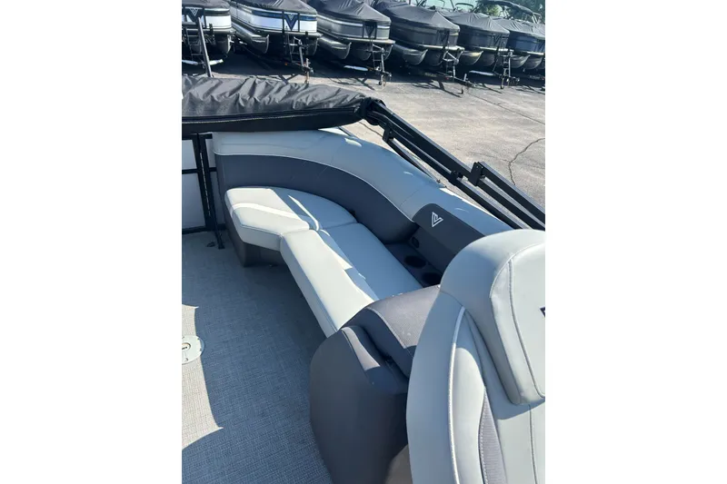 Slide: The Image of Luxurious seating on 2026 Viaggio Lago X-U 24 pontoon boat, showcasing modern design. - 13