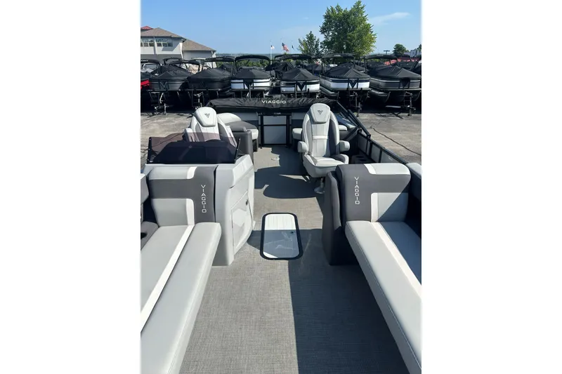 Slide: The Image of 2026 Viaggio Lago X-U 24 pontoon boat interior with modern seating and sleek design. - 19