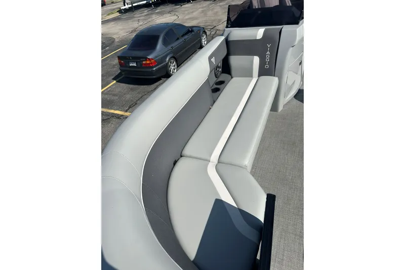 Slide: The Image of Luxurious seating on 2026 Viaggio Lago X-U 24 boat, featuring sleek gray upholstery. - 18