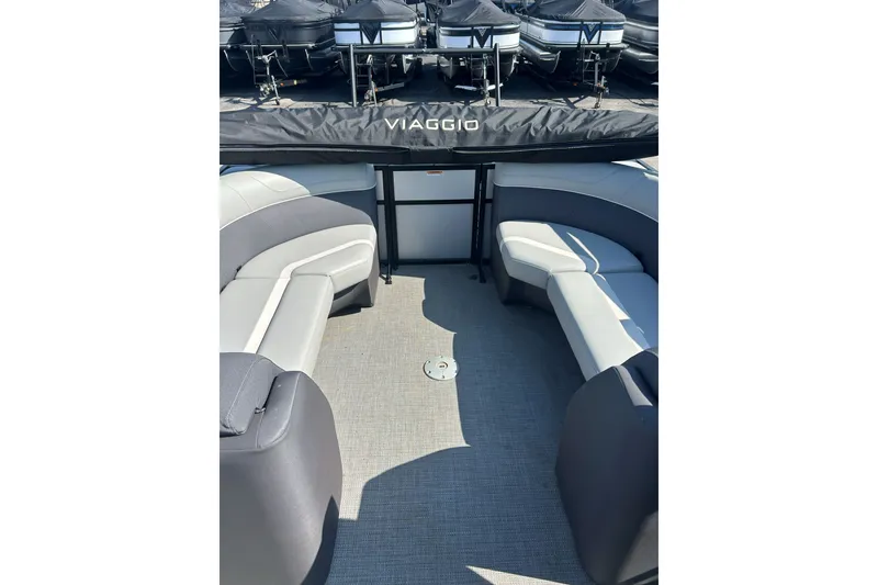 Slide: The Image of Interior view of 2026 Viaggio Lago X-U 24 pontoon boat with gray seating. - 8