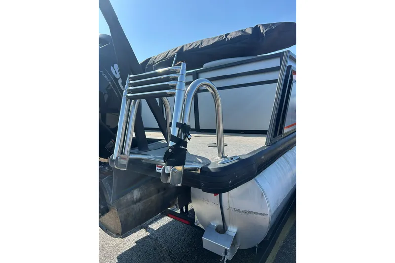 Slide: The Image of 2026 Viaggio Lago X-U 24 boat with stainless steel ladder and pontoon detail. - 21