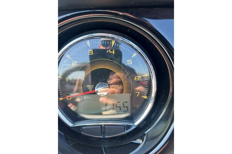 Slide: The Image of Close-up of Viaggio Lago X-U 24 tachometer, displaying RPM and digital reading. - 11