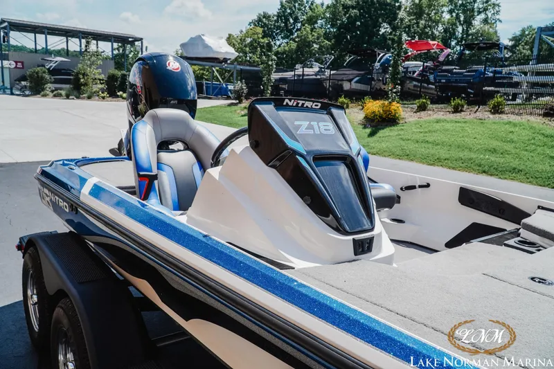 Slide: The Image of 2025 Nitro Z18 Pro boat at Lake Norman Marina, showcasing sleek design and modern features. - 6