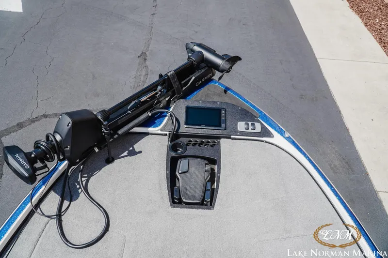 Slide: The Image of 2025 Nitro Z18 Pro boat deck with Garmin trolling motor and control panel. - 11
