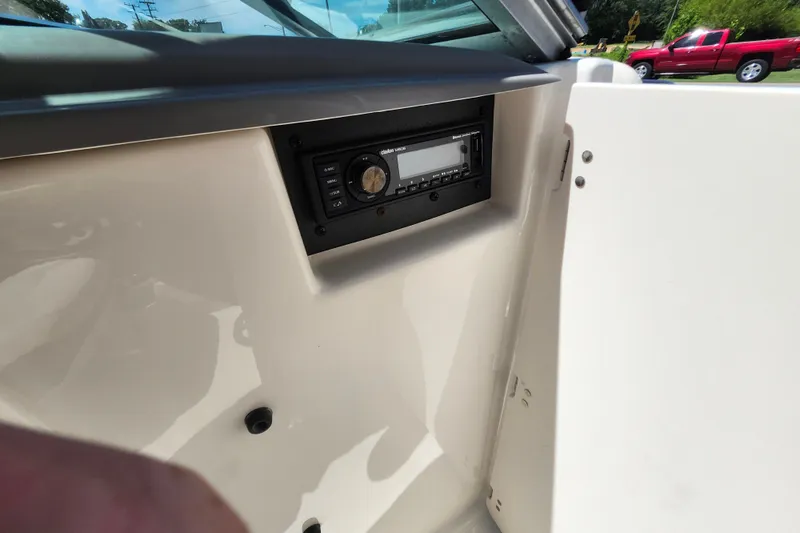 Slide: The Image of 2012 Chaparral 196 SSi boat interior with stereo system. - 18