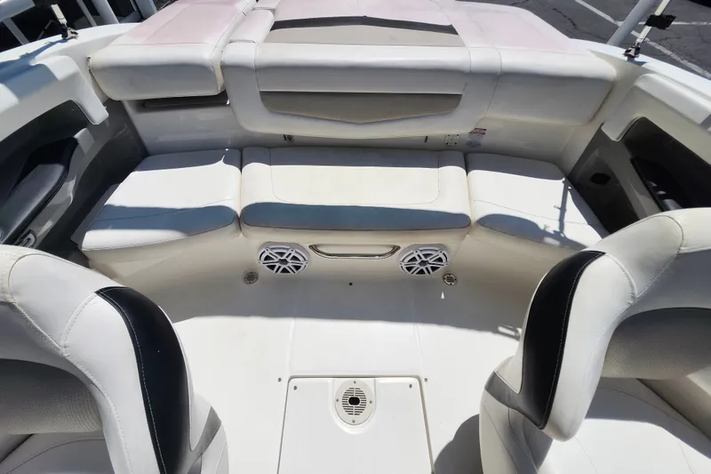 Slide: The Image of Interior of 2012 Chaparral 196 SSi boat with white seating and speakers. - 16