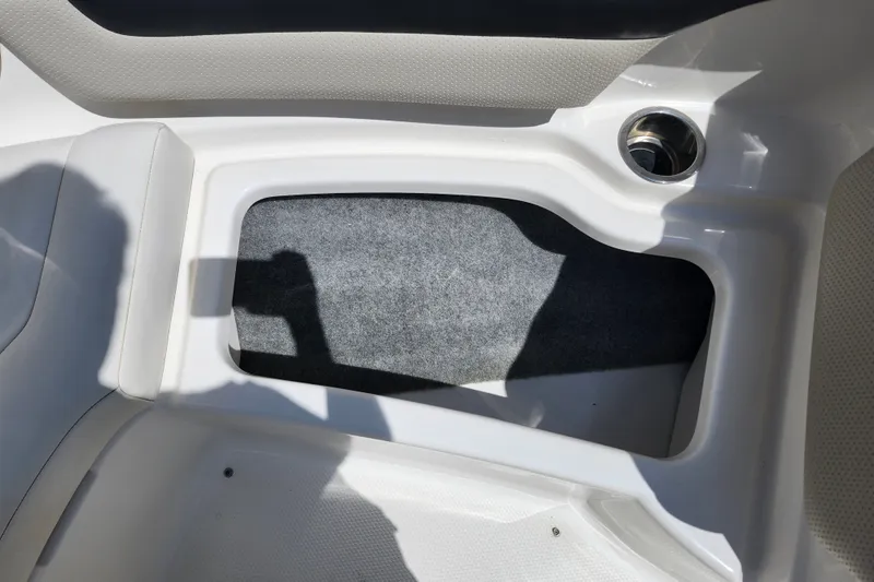 Slide: The Image of Interior storage compartment of a 2012 Chaparral 196 SSi boat. - 15