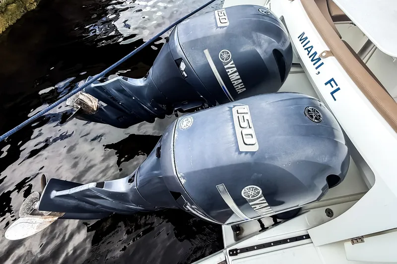 Slide: The Image of Twin Yamaha 150 outboard motors on a 2016 Jeanneau Merry Fisher 855 in Miami, FL. - 9