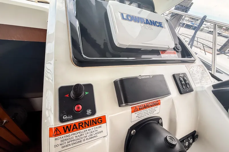 Slide: The Image of Control panel of a 2016 Jeanneau Merry Fisher 855 boat with Lowrance navigation system. - 21