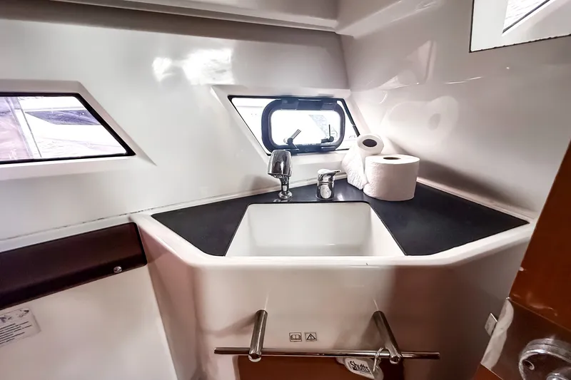 Slide: The Image of Compact bathroom sink area in 2016 Jeanneau Merry Fisher 855 boat. - 28