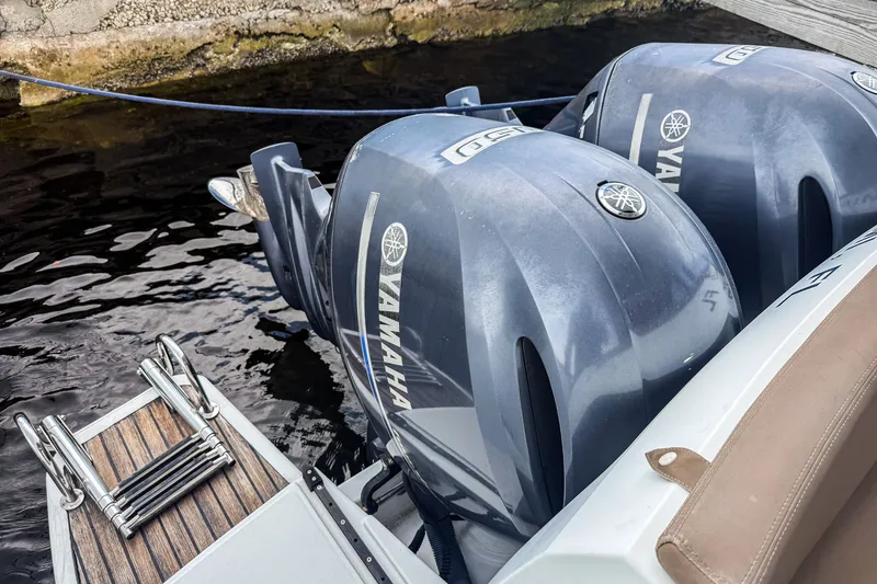 Slide: The Image of Twin Yamaha outboard engines on a 2016 Jeanneau Merry Fisher 855 boat. - 8