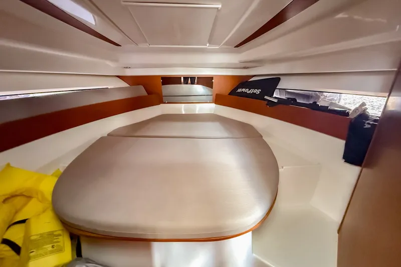 Slide: The Image of Interior cabin of 2016 Jeanneau Merry Fisher 855 with cozy sleeping area. - 27