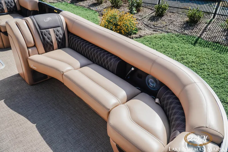 Slide: The Image of Luxurious seating on 2025 Barletta L25MAT pontoon boat, featuring elegant tan upholstery. - 15