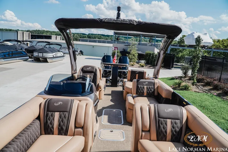Slide: The Image of 2025 Barletta L25MAT pontoon boat with luxurious seating at Lake Norman Marina. - 12