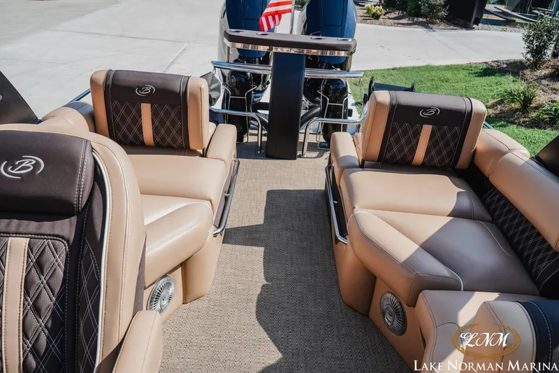 Slide: The Image of Luxurious interior of 2025 Barletta L25MAT pontoon boat with plush seating. - 17