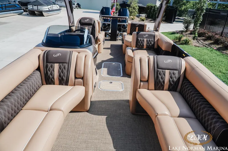 Slide: The Image of Luxurious 2025 Barletta L25MAT pontoon boat interior with plush seating at Lake Norman Marina. - 13