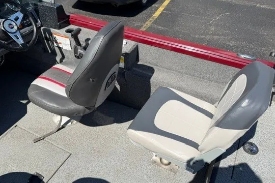 Slide: The Image of 2018 Ranger VS1670 SC boat interior with two seats and steering wheel. - 10
