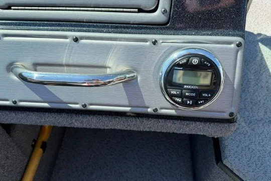 Slide: The Image of Control panel of a 2018 Ranger VS1670 SC boat with audio system and handle. - 33