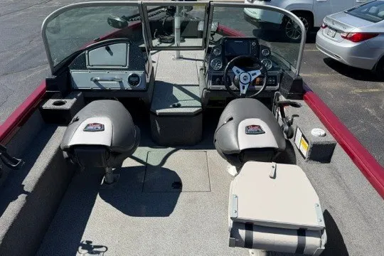 Slide: The Image of 2018 Ranger VS1670 SC boat interior with steering console and seating. - 7