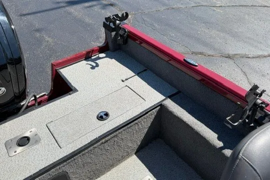 Slide: The Image of 2018 Ranger VS1670 SC boat interior with storage compartments and seating area. - 35