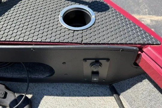Slide: The Image of 2018 Ranger VS1670 SC boat deck with cup holder and textured surface. - 27