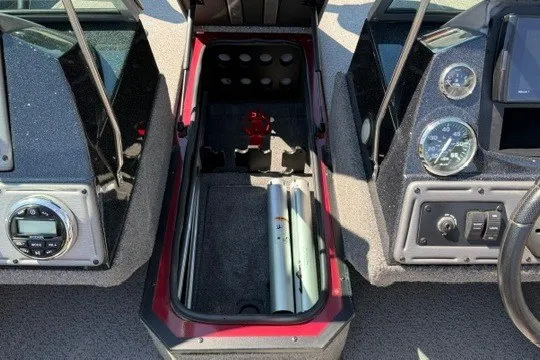 Slide: The Image of 2018 Ranger VS1670 SC boat dashboard with storage compartment and gauges. - 19