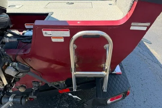 Slide: The Image of 2018 Ranger VS1670 SC boat stern with ladder and motor components. - 6