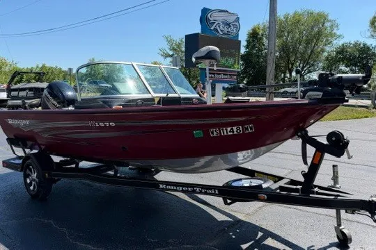 Slide: The Image of 2018 Ranger VS1670 SC boat on trailer, parked outdoors under clear sky. - 5