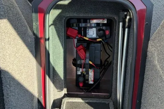 Slide: The Image of Battery compartment of a 2018 Ranger VS1670 SC boat, featuring wiring and connectors. - 20