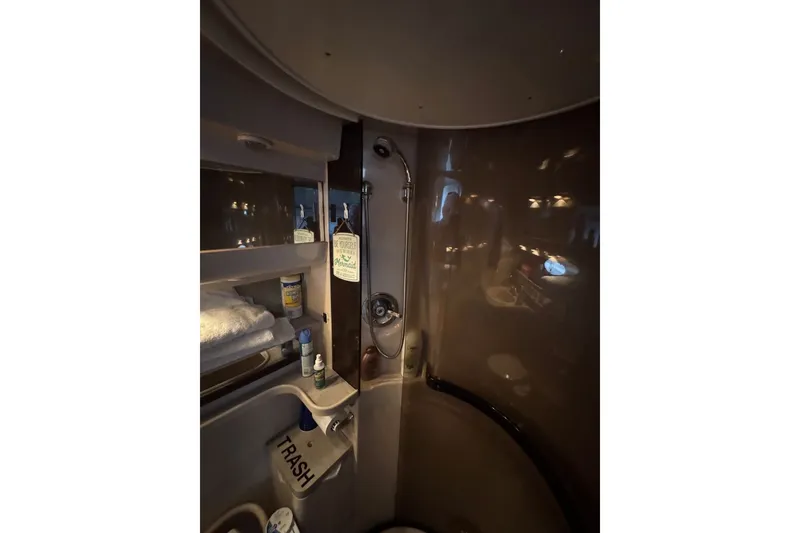 Slide: The Image of 1994 Regal Commodore 400 bathroom interior with shower and toiletries. - 35