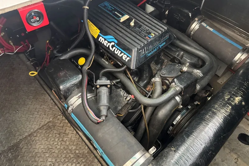 Slide: The Image of Engine compartment of a 1994 Regal Commodore 400 with MerCruiser 7.4L engine. - 41